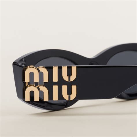 miu miu smu03d|Miu Miu Logo sunglasses Slate gray lenses .